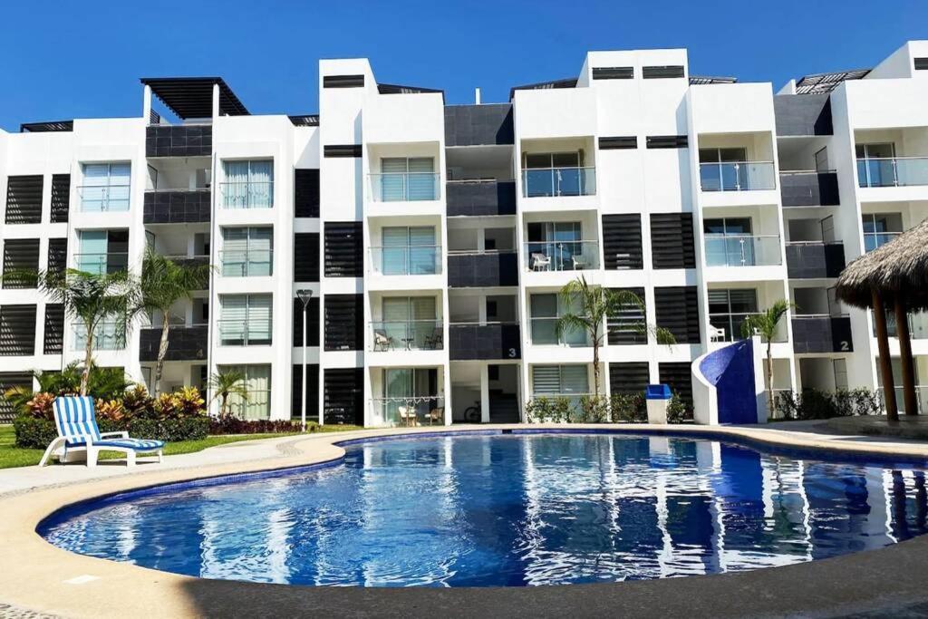 ¡NUEVO! Hermoso departamento con alberca. Manzanillo Exterior foto
